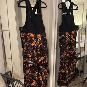 The North Face Black and Orange Floral snowboard pants / overalls small